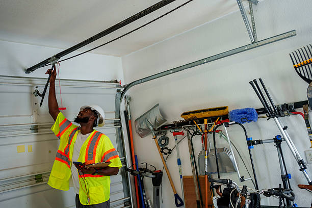 Professional Garage Door Panel Replacement technician working in Tri-City, OR